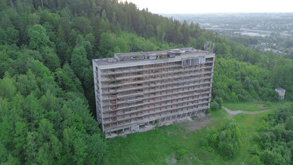 Forsaken hotel in lush forest