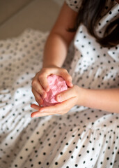 Girl Stretching Slime. Girl Playing with Pink Slime