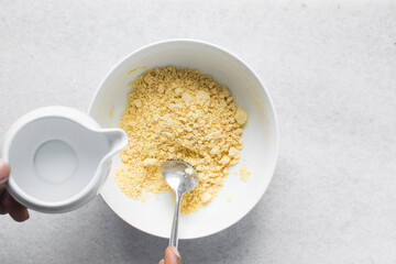 Overhead view of nigerian akamu or pap paste, process of making akamu, flatlay of process of making...