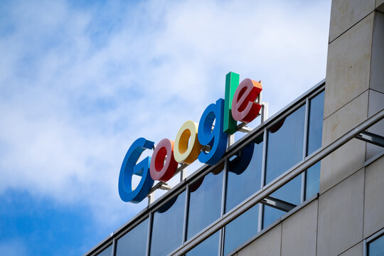 Google logo sign on the office building in Wrocław. American multinational corporation. Technology company signboard with the iconic brand logotype on June 17, 2024 in Wroclaw, Poland.