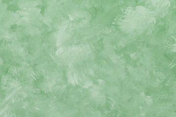 Painted green grungy background or texture, plaster, part of the wall, abstract wallpaper for design