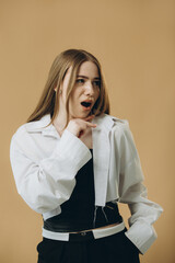 Portrait of thoughtful surprised girl pondering serious problems, looking with uncertain indecisive expression, making a choice.