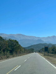 Fototapeta premium Empty road on the way to the Andes from Salta, Argentina