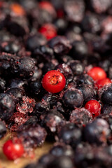 various blueberries after freezing are on the table