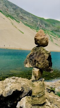 The rocks in a lake Pilato in Italy, that is a high mountain lake in the Apennines