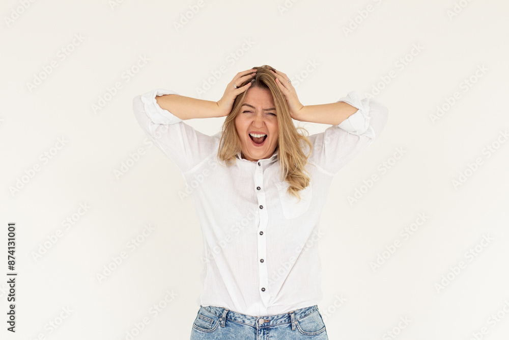 Poster Photo of shocked afraid cute girl open mouth hands head wear white shirt isolated white background