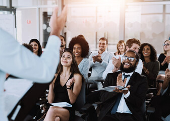 People, speaker and applause at workshop in office for training, support for company conference or...