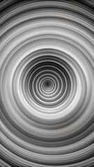 Obraz premium he image appears to show a grayscale abstract pattern with concentric circular or spiral shapes.