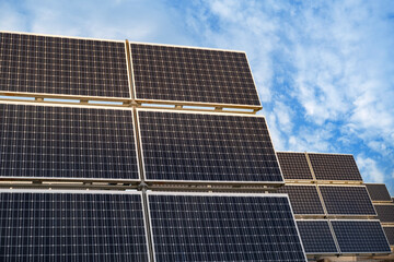 Rows photovoltaic panels stretch across solar farm, capturing sun's energy for sustainable future,...