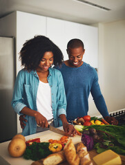 Black couple, people and smile in kitchen with vegetables for cooking on diet, nutrition and health. Home, relationship and happy with fresh food for organic, vegetarian meal and wellness or dinner