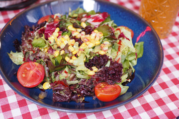Close up bowl of mixed vegetables salad