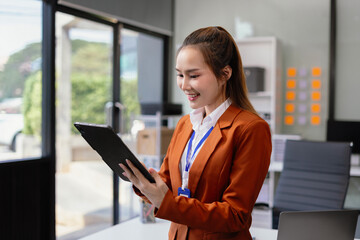 Business concepts, business people working in the work area with smartphones and data sheets at the...