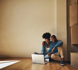 Happy couple, new home and laptop on floor for shopping, research decor ideas and finance plan in...