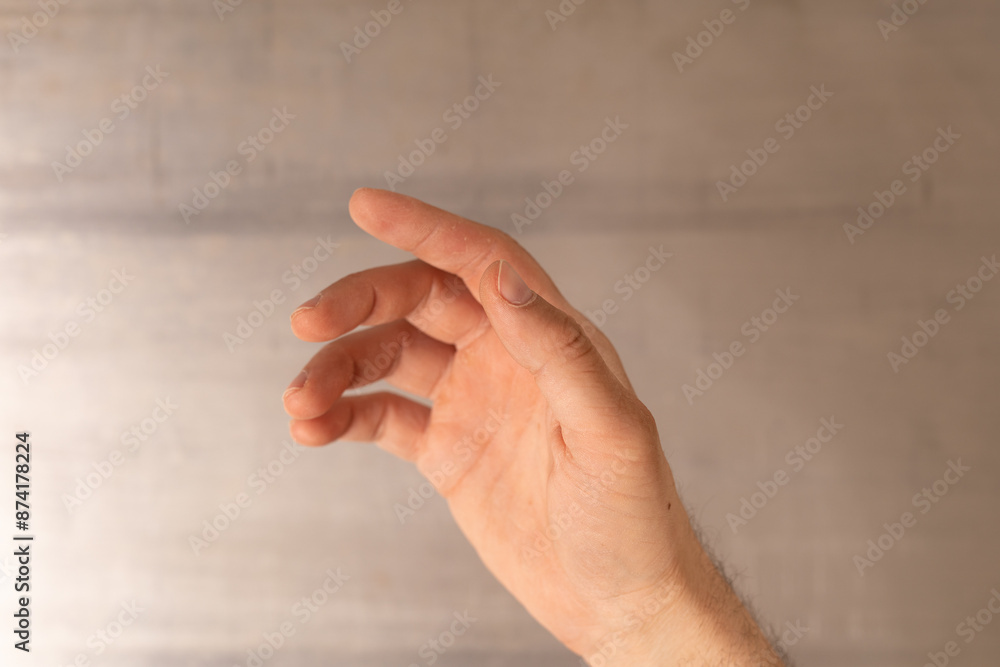 Poster a hand reaching out towards an empty space