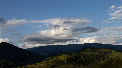 Mountain landscape with dramatic clouds