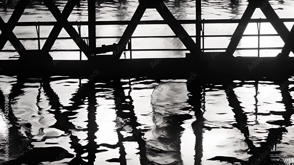 Poster the distorted reflection of a bridge in the water its shadows and lines appearing warped and twisted