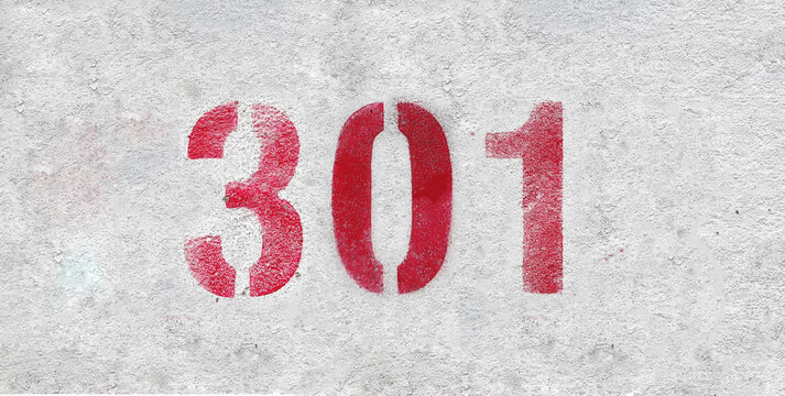 Red Number 301 on the white wall. Spray paint.