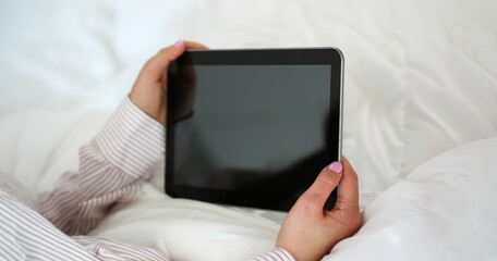 Close-up of woman holding tablet device with locked screen, turned off gadget. Tablet doesnt work,...