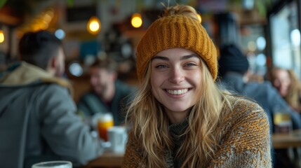 Smiling Woman in a Pub Wearing Knit Hat and Sweater