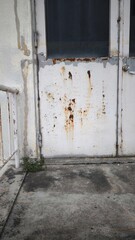 Rust on the white iron door