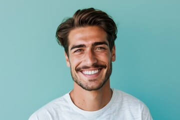 Fototapeta premium Portrait of a grinning man in his 30s donning a trendy cropped top isolated in pastel or soft colors background
