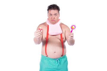 Funny fat man portrays a child with a pacifier. White background.