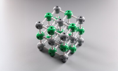Close-up of molecular dna model structure on grey surface, cells connected to each other....