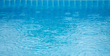 raining on the pool water