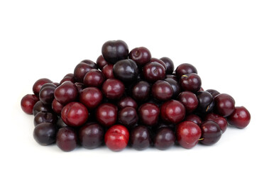 Heap of ripe plums isolated on white 