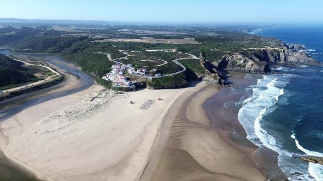 Praia de Odeceixe beach in Algarve, Portugal, aerial shot. Southwest Alentejo and Vicentine Coast