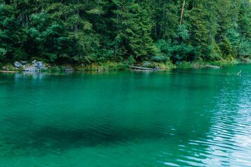 Lake with mountains in the background in the Bavarian foothills of the Alps