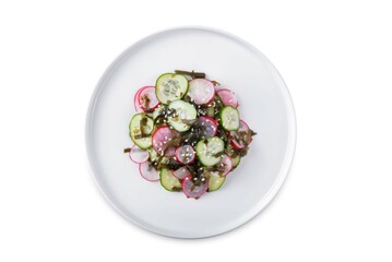 Seaweed radish cucumber salad in a plate on a white isolated background