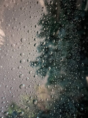 Fototapeta premium small drops of water on a misted glass,