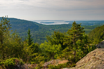 distant view of Bar Harbor Maine from mountain top overlook.