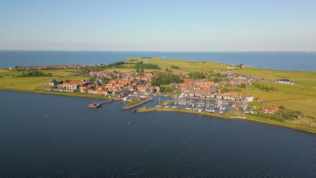 Aerial drone view of the town with a marina on the island named Marken in the Markermeer, the Netherlands. 