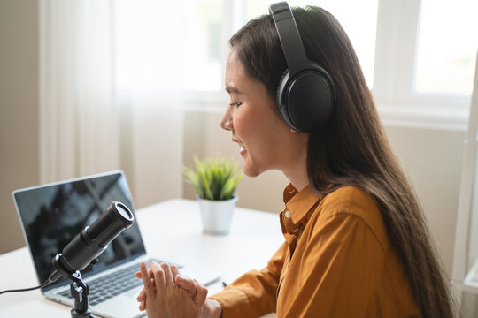 Close-up microphone on the table in podcasting record.