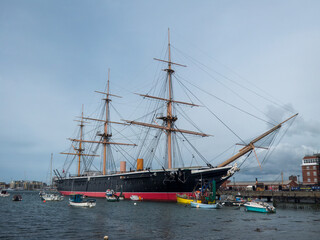Portsmouth England - May 3 2024: HMS Warrior 1860 a 40 gun steam powered armoured frigate in Portsmouth Harbour Hampshire England