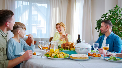 Happy family celebrate child's birthday. Relatives spend great time together taking cheerfully. Birthday party for family member.