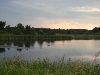 The natural beauty of the wetlands within the Bombay Hook National Wildlife Refuge, during a stormy summer day, Kent County, Delaware.
