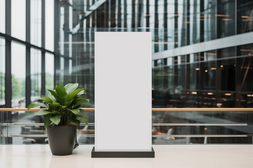 Blank white billboard stand or mupi mockup with plant in company lobby background