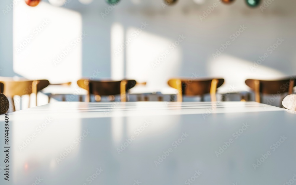 Poster bright sunlit modern kitchen with smooth white table for product display, green and white color sche