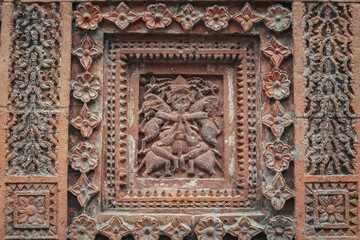 Beautiful details and bas reliefs of ancient Hindu Pancharatna Temple (Temple of the Five Jewels) in Puthia Bangladesh