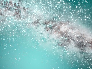 Fototapeta premium Abstract Cosmic Dust Explosion in Teal Sky A Captivating Display of Light and Color