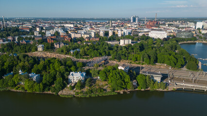 Fototapeta premium Helsinki city capital fo Finland. These drone photos capture the beautiful city of Helsinki from the sky, showcasing its stunning architecture, vibrant cityscape, and the harmonious blend of modernity