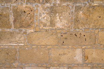 Fototapeta premium Yellow brick wall, copy space, brick texture, background