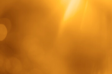 blurred image. shiny sun, sunbeams, sunrays, sunshine design. Yellow orange warm light effect, sun rays, golden beams isolated on white background. star dust