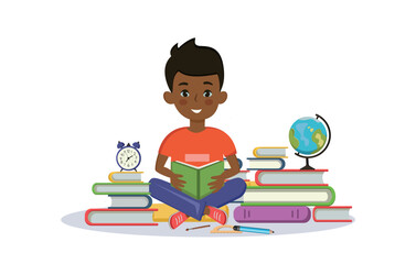 Dark-skinned boy sits on books and reads a book