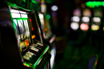 Detailed 4K Ultra HD Image of Casino Slot Machines with Shallow Depth of Field
