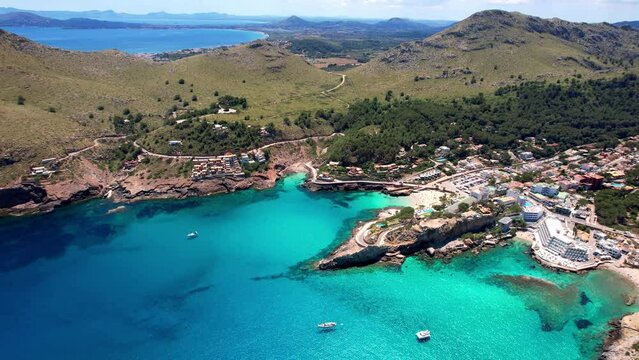 Northern coast of Mallorca Cala Clara and Cala Carbo beaches, aerial drone flyover of turquoise sea and rocky cliffs, Balearic Islands Spain. 4K cinematic establishing B-roll