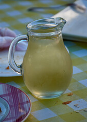Golden Elegance: White Wine in a Crystal Jug
